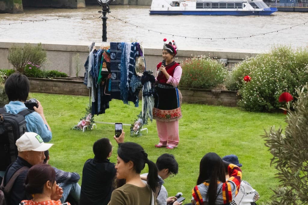 Yunnan cultural showcase with indigo batik textiles beside the Thames